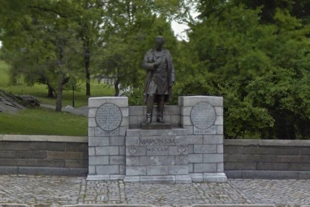 The statue of Dr. J. Marion Sims, which sits at the Fifth Avenue and 103rd Street entrance to Central Park